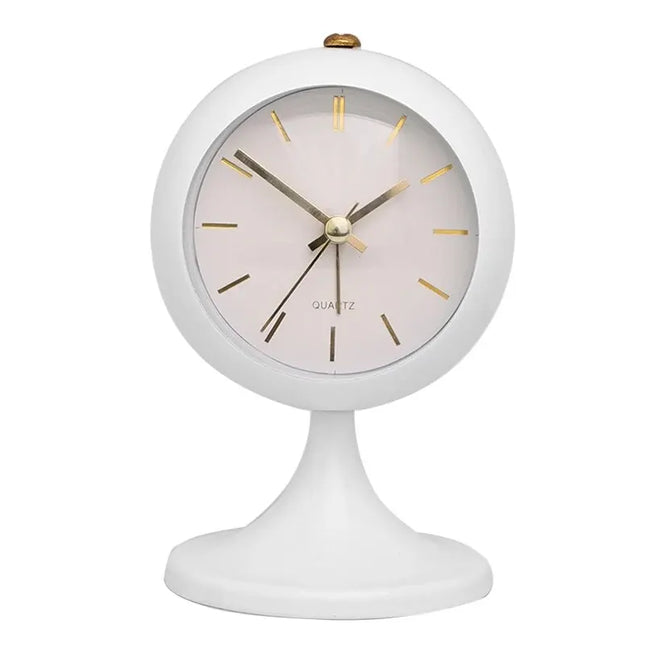 Vintage-herätyskello jalustalla makuuhuoneeseen