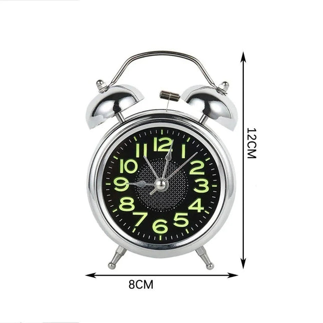 Perinteinen herätyskello valaistuilla numeroilla