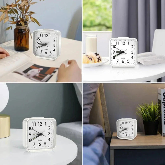 Analoginen herätyskello valaistuilla viisareilla