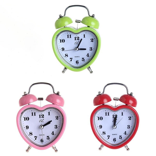 Sydämenmuotoinen herätyskello tuplakelloilla