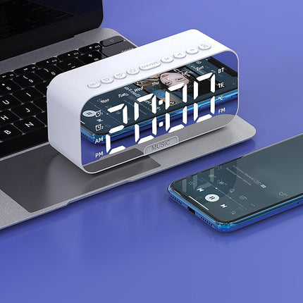 Kannettava Bluetooth-kaiutin herätyskellolla