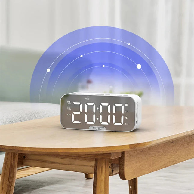 Kannettava Bluetooth-kaiutin herätyskellolla