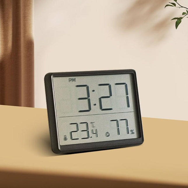 Ohut digitaalinen matkaherätyskello lämpömittarilla