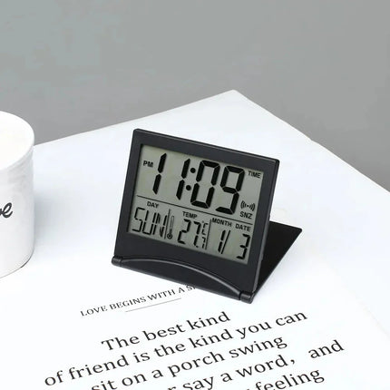 Kokoontaitettava pieni matkaherätyskello