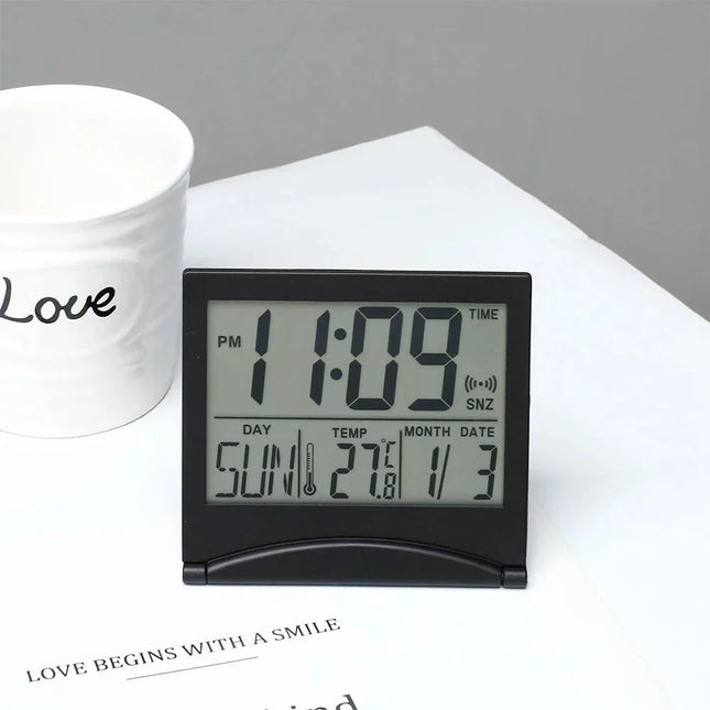 Kokoontaitettava pieni matkaherätyskello