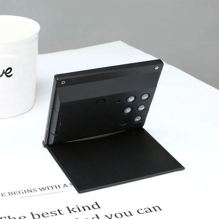 Kokoontaitettava pieni matkaherätyskello