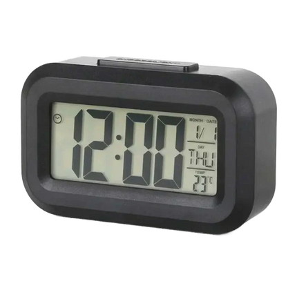 Pieni digitaalinen herätyskello valolla