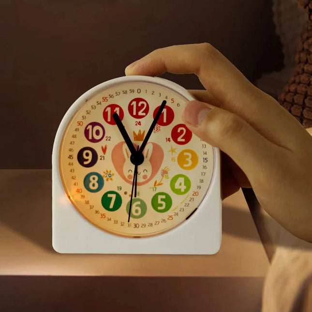 Vaaleanpunainen pupu herätyskello kellon opetteluun