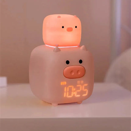 Vaaleanpunainen possu herätyskello lapsen huoneeseen