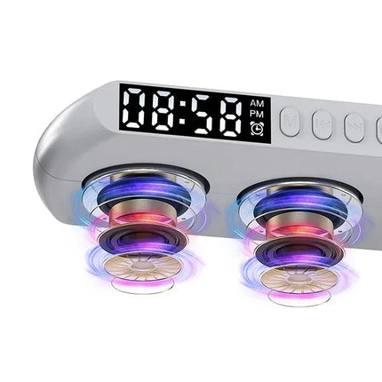 Monivärinen lamppu herätyskellolla ja kaiuttimella